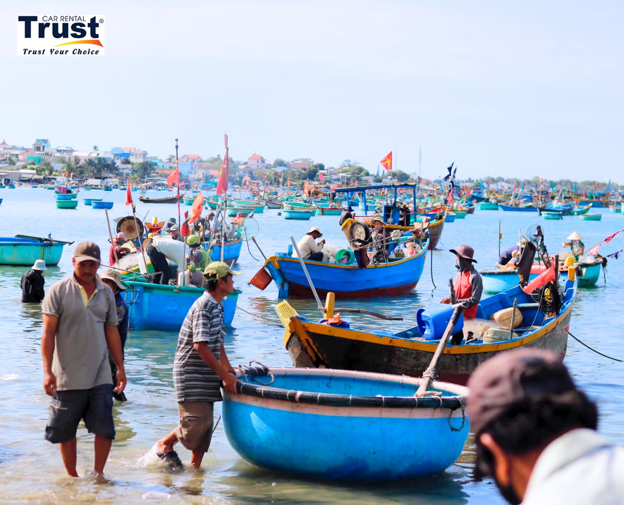 a-bustling-scene-at-mui-ne-fishing-village-with-numerous-colorful-boats-in-the-water
