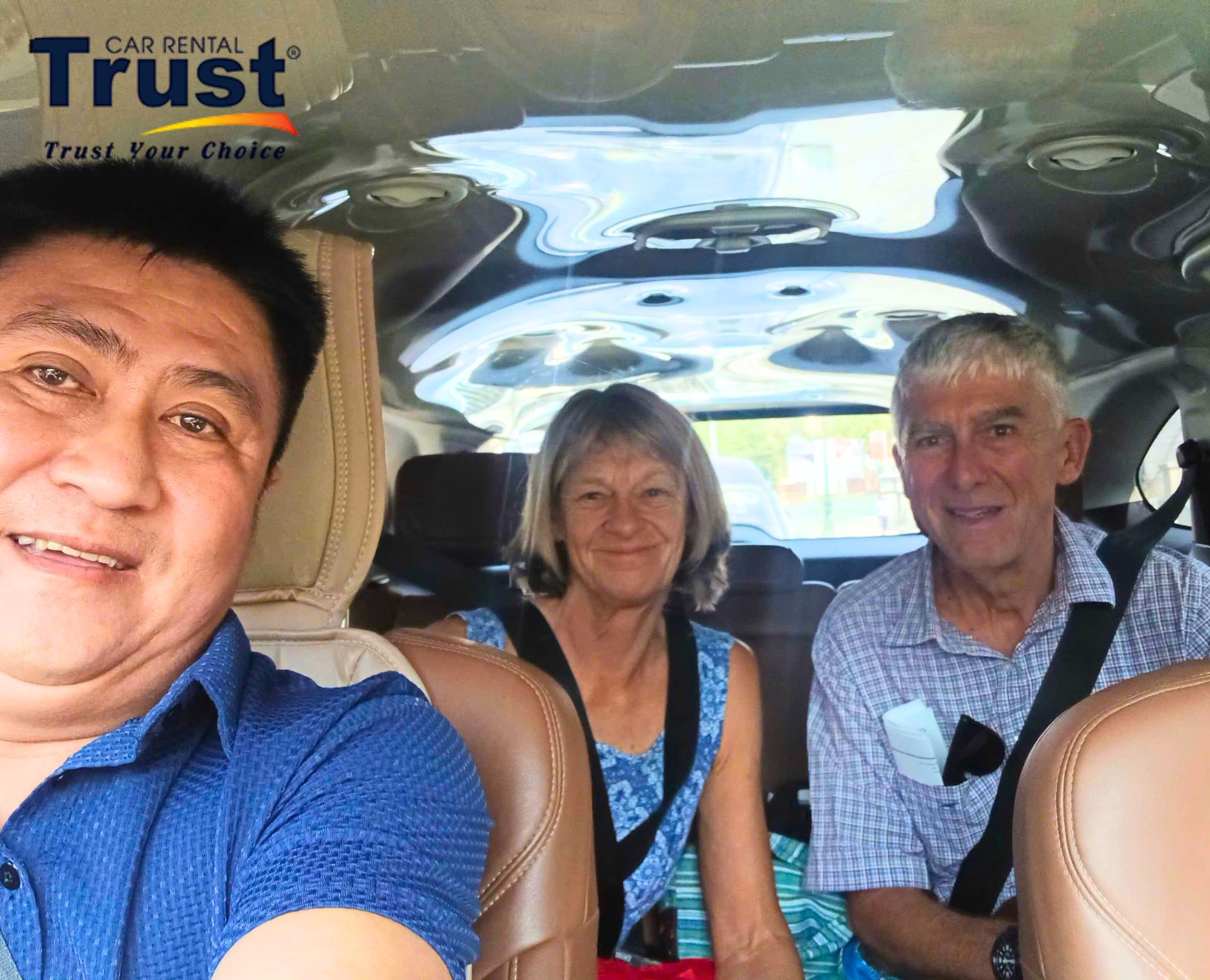 A driver took a photo with an Australian couple before starting the trip across Vietnam from South to North