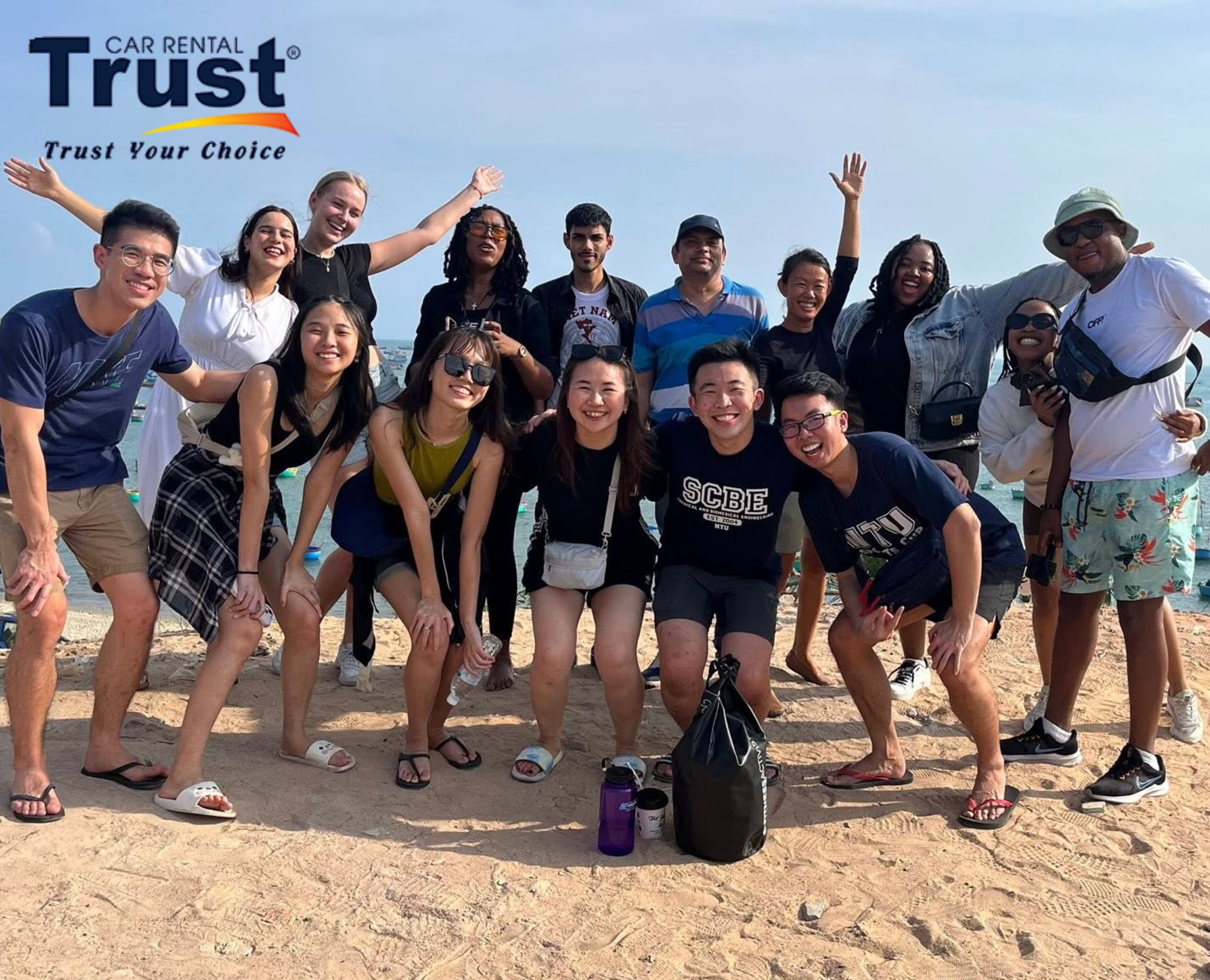 A group of international friends take photos at Mui Ne Fishing Village, one of the famous destinations