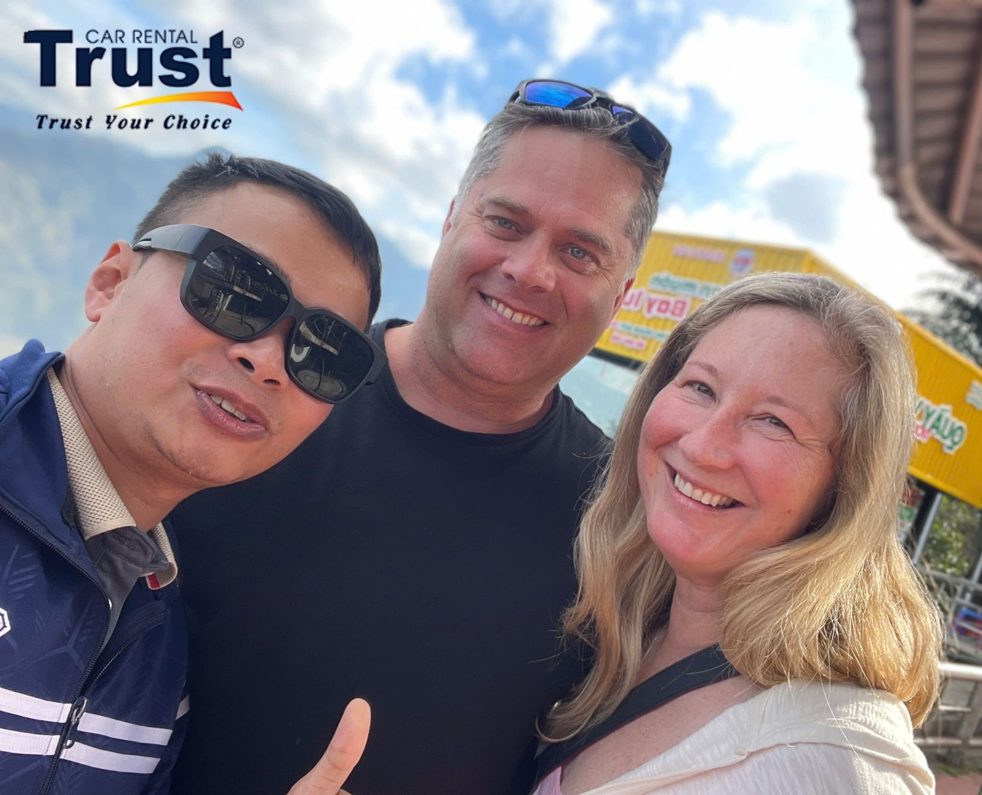 friendly-driver-and-smiling-international-travelers-enjoying-a-seamless-taxi-ninh-binh-to-sapa-private-car-service