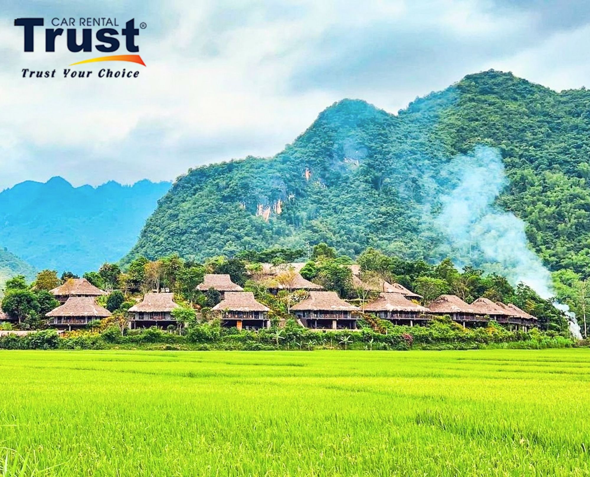 panoramic-view-of-mai-chau-village-surrounded-by-forested-mountains-and-vibrant-rice-paddies-travel-with-ease-via-private-car-nghia-lo-to-mai-chau