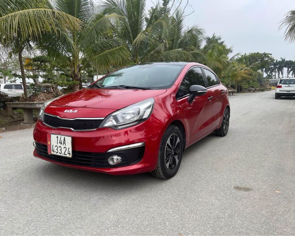 Red Sedan Kia Rio 4 seater