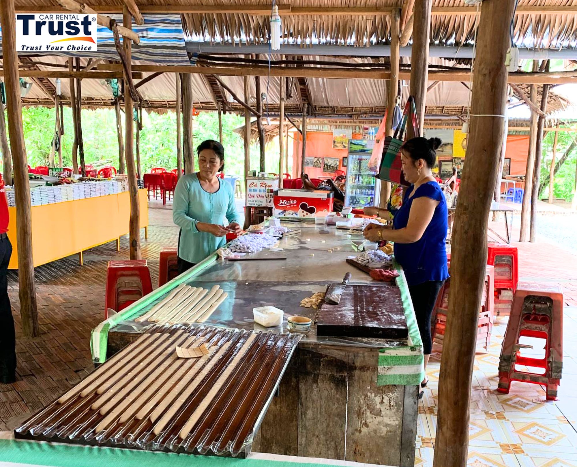 scene-of-coconut-candy-being-made-by-hand-at-a-workshop-in-the-mekong-delta
