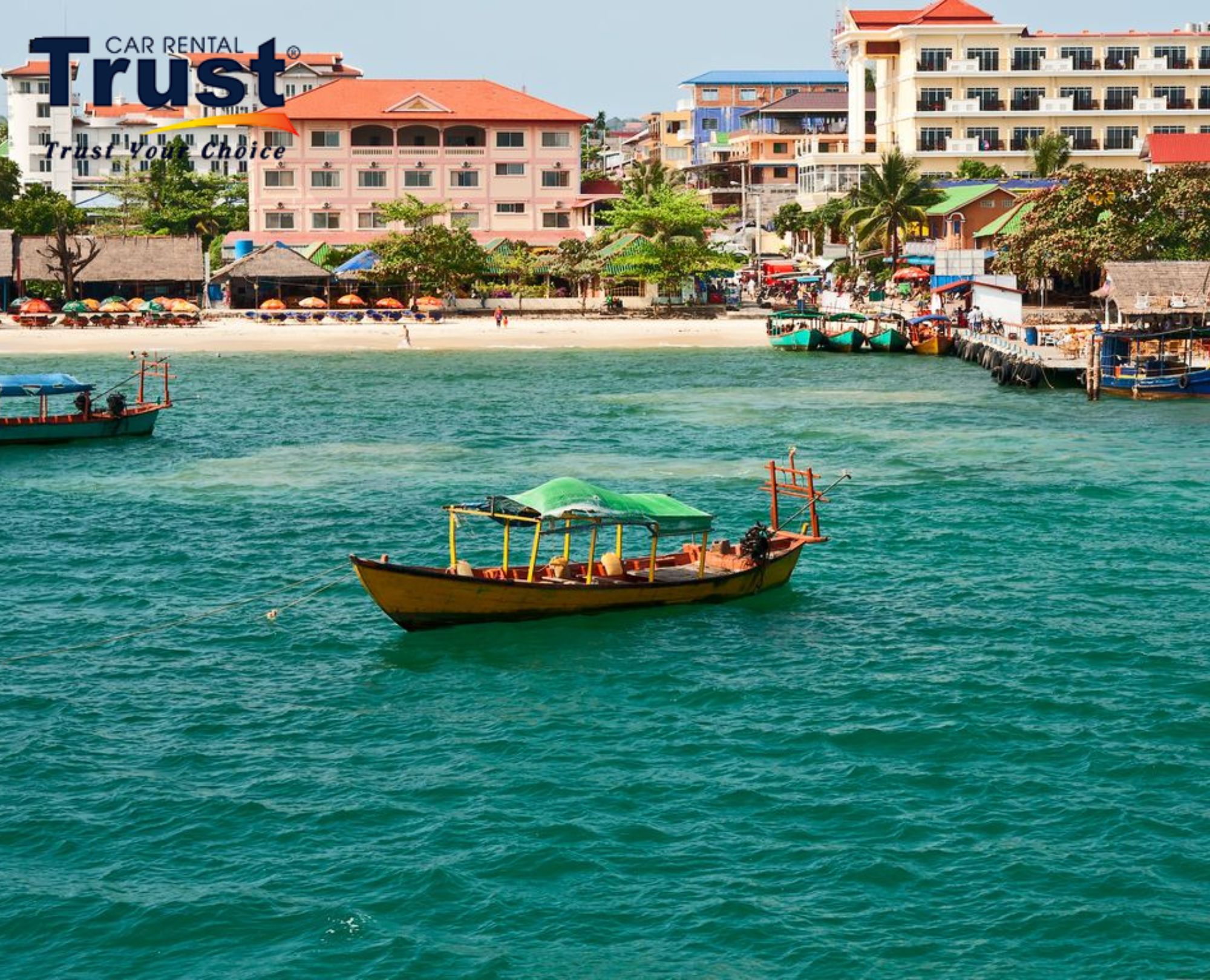 Scenic Sihanoukville waterfront with colorful boats ideal for Sihanoukville Cruise Ship Tour By Private Car