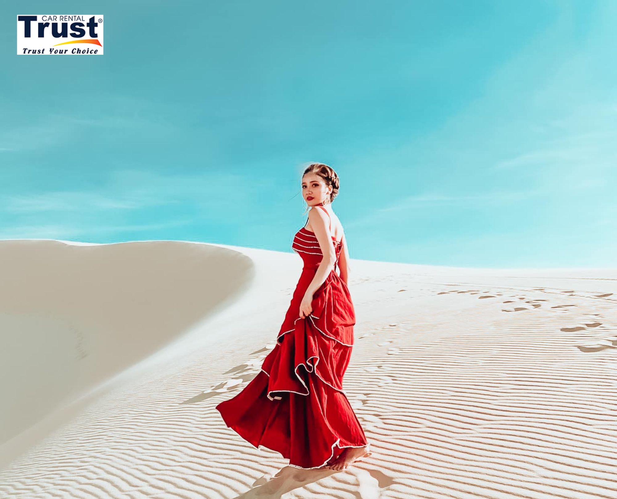 scenic-view-of-the-vast-white-sand-dunes-in-mui-ne-with-a-figure-in-a-vibrant-dress