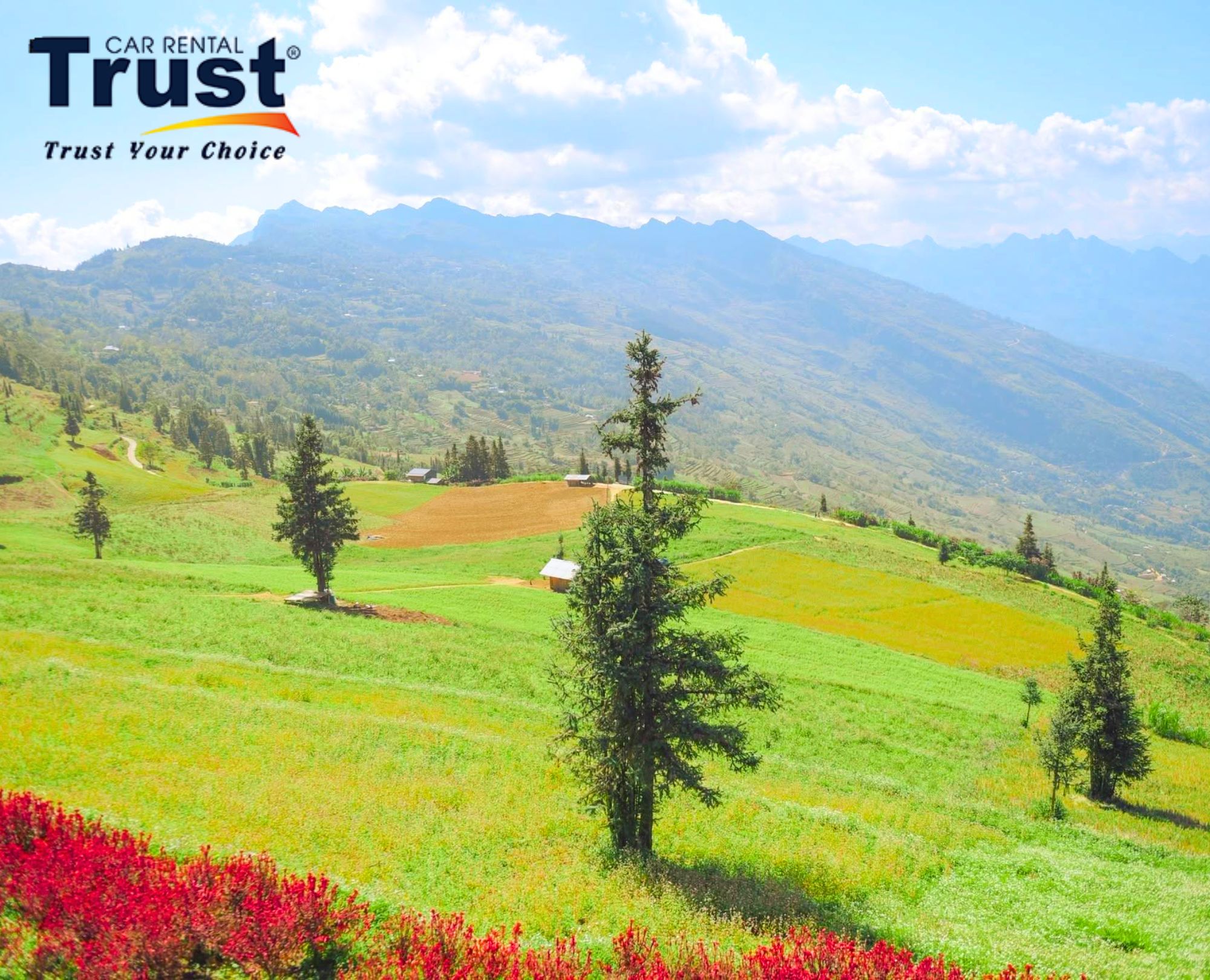 Suoi Thau hillside landscape blending green slopes, cultivated fields and small farm homes