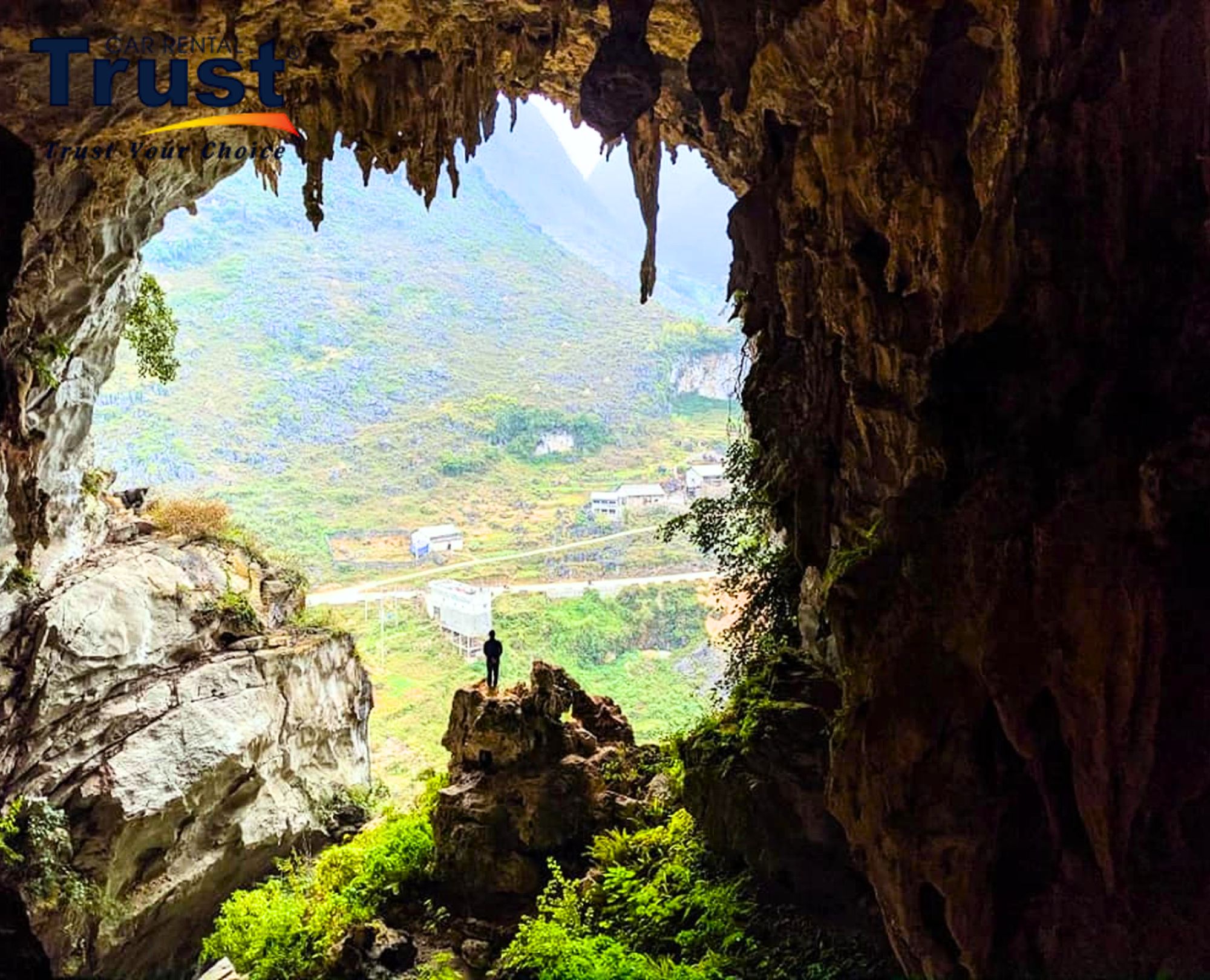 View from inside Meo Vac cave showing sharp rock formations and hazardous terrain for visitors