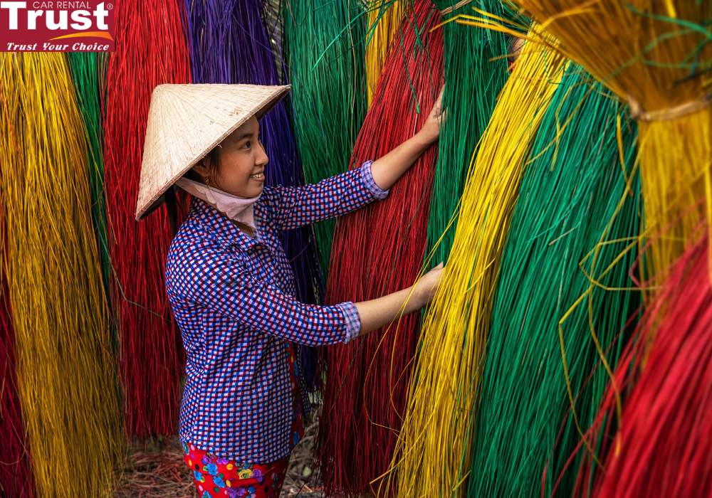 craftsman drying traditional vietnam mats in Dong Thap